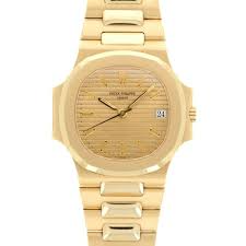 Patek Philippe Nautilus - 33 x 35 MM - Yellow Gold - 3900/1J