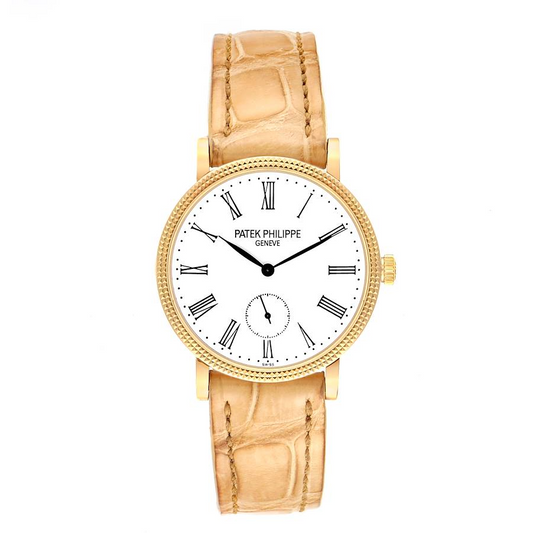 Patek Philippe  Calatrava - 31 MM - Yellow Gold - 7119J